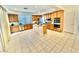 Bright kitchen with granite countertops, stainless steel appliances, and a functional island at 10680 Sapphire Vista Ave, Las Vegas, NV 89144