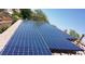 View of newly installed solar panels on a roof, highlighting energy efficiency and eco-friendly technology at 10680 Sapphire Vista Ave, Las Vegas, NV 89144
