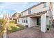 Spacious backyard featuring a brick patio, manicured lawn, and ample space for outdoor entertaining at 16 Cresta Villa Ct, Henderson, NV 89011