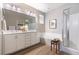 Elegant bathroom with dual sinks, soaking tub, and separate shower at 16 Cresta Villa Ct, Henderson, NV 89011