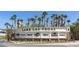 Prominent sign for Lake Las Vegas community surrounded by many palm trees and luxurious residences at 16 Cresta Villa Ct, Henderson, NV 89011