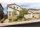 Charming two-story house with a well-manicured lawn and attached two car garage at 16 Cresta Villa Ct, Henderson, NV 89011