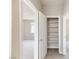 Hallway featuring a linen closet, leading to the bedroom at 16 Cresta Villa Ct, Henderson, NV 89011