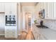 Kitchen with stainless appliances, including double oven, quartz countertops and pantry at 16 Cresta Villa Ct, Henderson, NV 89011