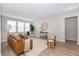 Comfortable living room featuring three large windows allowing for plenty of natural light at 16 Cresta Villa Ct, Henderson, NV 89011