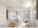 Open loft area with comfortable seating, tasteful decor, and abundant natural light at 16 Cresta Villa Ct, Henderson, NV 89011