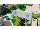 Aerial view of the community basketball court surrounded by trees and green spaces at 161 Lenape Heights Ave, Las Vegas, NV 89148