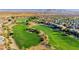 Scenic aerial view of a lush golf course winding through a residential community at 161 Lenape Heights Ave, Las Vegas, NV 89148