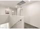 Open hallway leads to various rooms, showcasing clean lines and modern lighting, creating a welcoming transition at 1783 Matteo Cove Pl, North Las Vegas, NV 89084