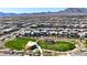 Planned community with a playground nestled beneath majestic mountains, offering picturesque scenery at 182 Robledo St, Las Vegas, NV 89138