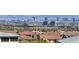 Distant view of the Las Vegas skyline from a vibrant community with desert landscaping at 182 Robledo St, Las Vegas, NV 89138