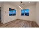 Flex room featuring modern lighting, and several windows providing natural light at 182 Robledo St, Las Vegas, NV 89138