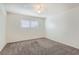 Comfortable bedroom featuring carpet and natural light from the window at 212 Orland St # 19, Las Vegas, NV 89107