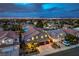 Stunning aerial shot of a home with lush landscaping in a peaceful residential neighborhood at 2248 Verde Cape Ave, Henderson, NV 89052