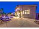 Home exterior with a pool, balcony, and patio area, offering a seamless blend of indoor and outdoor living spaces at 2248 Verde Cape Ave, Henderson, NV 89052