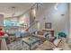 Comfortable living room with soaring ceilings showcases decor and hardwood floors at 2248 Verde Cape Ave, Henderson, NV 89052