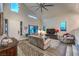 Spacious living room featuring high ceilings, ample natural light, and modern decor at 2248 Verde Cape Ave, Henderson, NV 89052