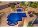 Aerial view of a sparkling pool with spa and lounge area at 2248 Verde Cape Ave, Henderson, NV 89052
