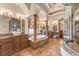 Stunning bathroom with a soaking tub, dual vanities, and a walk-in shower at 2780 El Camino Rd, Las Vegas, NV 89146