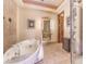 The main bathroom features a soaking tub and separate walk-in shower at 2780 El Camino Rd, Las Vegas, NV 89146
