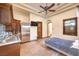Bedroom featuring a kitchenette area with stainless steel appliances and abundant cabinet space at 2780 El Camino Rd, Las Vegas, NV 89146