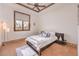 Comfortable bedroom with a large window, neutral walls and carpet at 2780 El Camino Rd, Las Vegas, NV 89146
