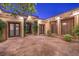 Beautiful courtyard featuring access to the main home with desert landscaping and stamped concrete at 2780 El Camino Rd, Las Vegas, NV 89146