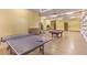 Spacious garage featuring a ping pong table, pool table, and ample storage space at 2780 El Camino Rd, Las Vegas, NV 89146
