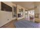 Comfortable living room with a fireplace and large windows offering abundant natural light at 2780 El Camino Rd, Las Vegas, NV 89146