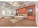 Spacious primary bedroom featuring coffered ceilings, and neutral color palette with large windows and plush carpet at 2780 El Camino Rd, Las Vegas, NV 89146