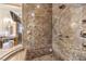 Luxurious walk-in shower with marble tile and multiple shower heads at 2780 El Camino Rd, Las Vegas, NV 89146