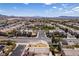 Aerial view of a neighborhood with lush landscaping and mountain views at 2929 Salado Creek Ave, North Las Vegas, NV 89081