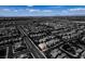 High up aerial view of a dense suburban setting with uniform houses laid out with streets; one highlighted at 2929 Salado Creek Ave, North Las Vegas, NV 89081
