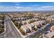Neighborhood aerial showcasing the community's layout with tree-lined streets and mountain views in the distance at 2929 Salado Creek Ave, North Las Vegas, NV 89081