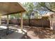 Spacious backyard featuring a covered patio and desert landscaping at 2929 Salado Creek Ave, North Las Vegas, NV 89081