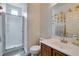Well-lit bathroom with a walk-in shower and a vanity sink at 2929 Salado Creek Ave, North Las Vegas, NV 89081