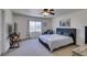 Inviting bedroom showcasing a large window and comfortable seating area at 2929 Salado Creek Ave, North Las Vegas, NV 89081