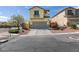Charming two-story home featuring a neutral color palette, a two-car garage, and low maintenance landscaping at 2929 Salado Creek Ave, North Las Vegas, NV 89081