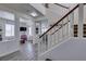 Bright foyer with staircase, showcasing open floor plan and modern flooring that create a welcoming atmosphere at 2929 Salado Creek Ave, North Las Vegas, NV 89081