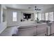Open living room featuring an entertainment center, a ceiling fan, recessed lighting, and plenty of natural light at 2929 Salado Creek Ave, North Las Vegas, NV 89081