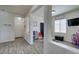 Playroom and entryway featuring wood-look floors and white walls at 2929 Salado Creek Ave, North Las Vegas, NV 89081