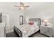 Stylish bedroom with a black metal frame bed, hardwood floors, and Paris-themed bedding for a unique touch at 366 Rancho La Costa St, Las Vegas, NV 89138