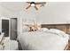 Modern bedroom with stylish furnishings, mirrored closet doors and ensuite bathroom at 366 Rancho La Costa St, Las Vegas, NV 89138