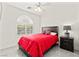 Comfortable bedroom featuring an arched window with bright, natural light at 366 Rancho La Costa St, Las Vegas, NV 89138