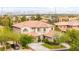 Two-story home features a well-manicured front yard and desert landscaping at 366 Rancho La Costa St, Las Vegas, NV 89138