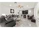 Bright living room with fireplace, stylish decor, and lots of natural light at 366 Rancho La Costa St, Las Vegas, NV 89138
