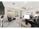 Open-concept living area with lots of light, fireplace, and modern decor creating a comfortable living space at 366 Rancho La Costa St, Las Vegas, NV 89138