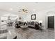Open-concept floor plan showcasing living room with dining and kitchen in the background great for entertaining guests at 366 Rancho La Costa St, Las Vegas, NV 89138