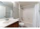 Standard full bathroom with a sink, toilet, mirror, and shower with a tub at 3975 N Hualapai Way # 212, Las Vegas, NV 89129
