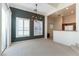 Dining room featuring a modern light fixture and access to the kitchen at 3975 N Hualapai Way # 212, Las Vegas, NV 89129